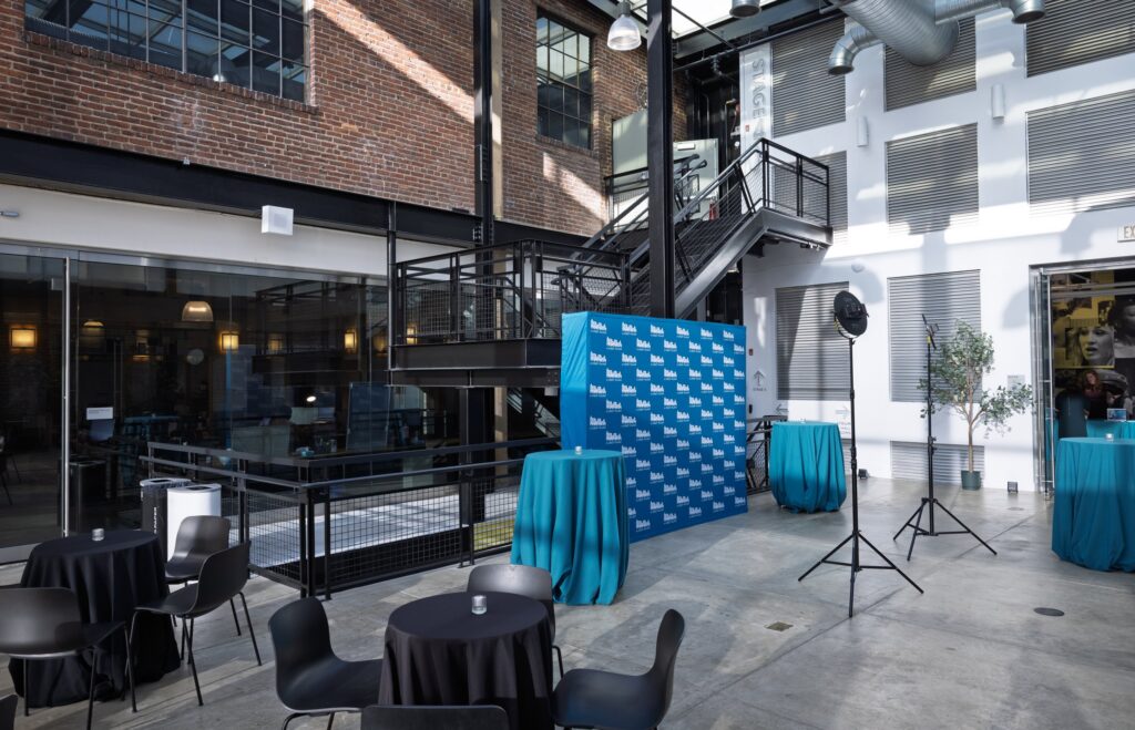 The decorated event space for N Street Village's 2025 "Meeting the Moment" event stands ready to receive guests.