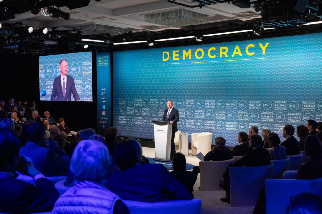 Speaker on stage at the Halifax International Security Forum 2025