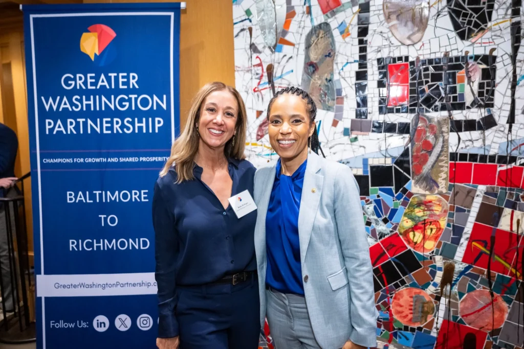 Two women smile for the camera at the 2025 Greater Washington Partnership Congressional Reception