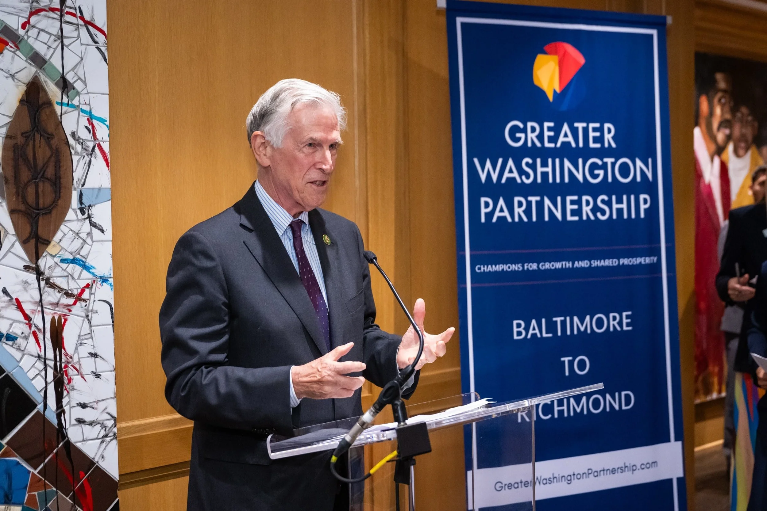 A man speaks at the podium at the 2025 Greater Washington Partnership Congressional Reception