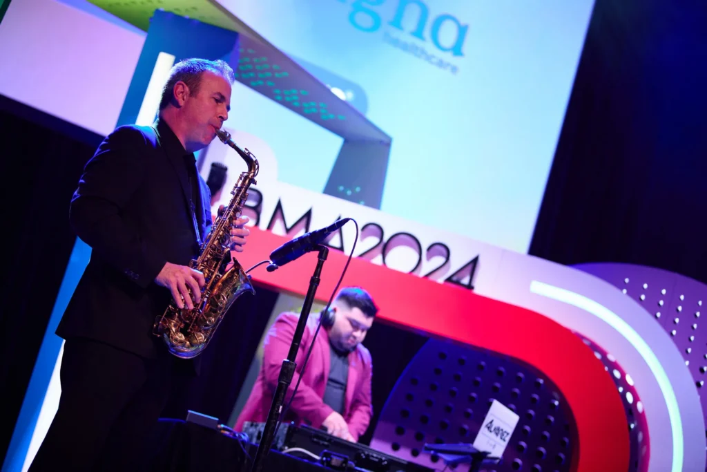 Musicians play onstage at the 2024 Bozzuto Management Awards