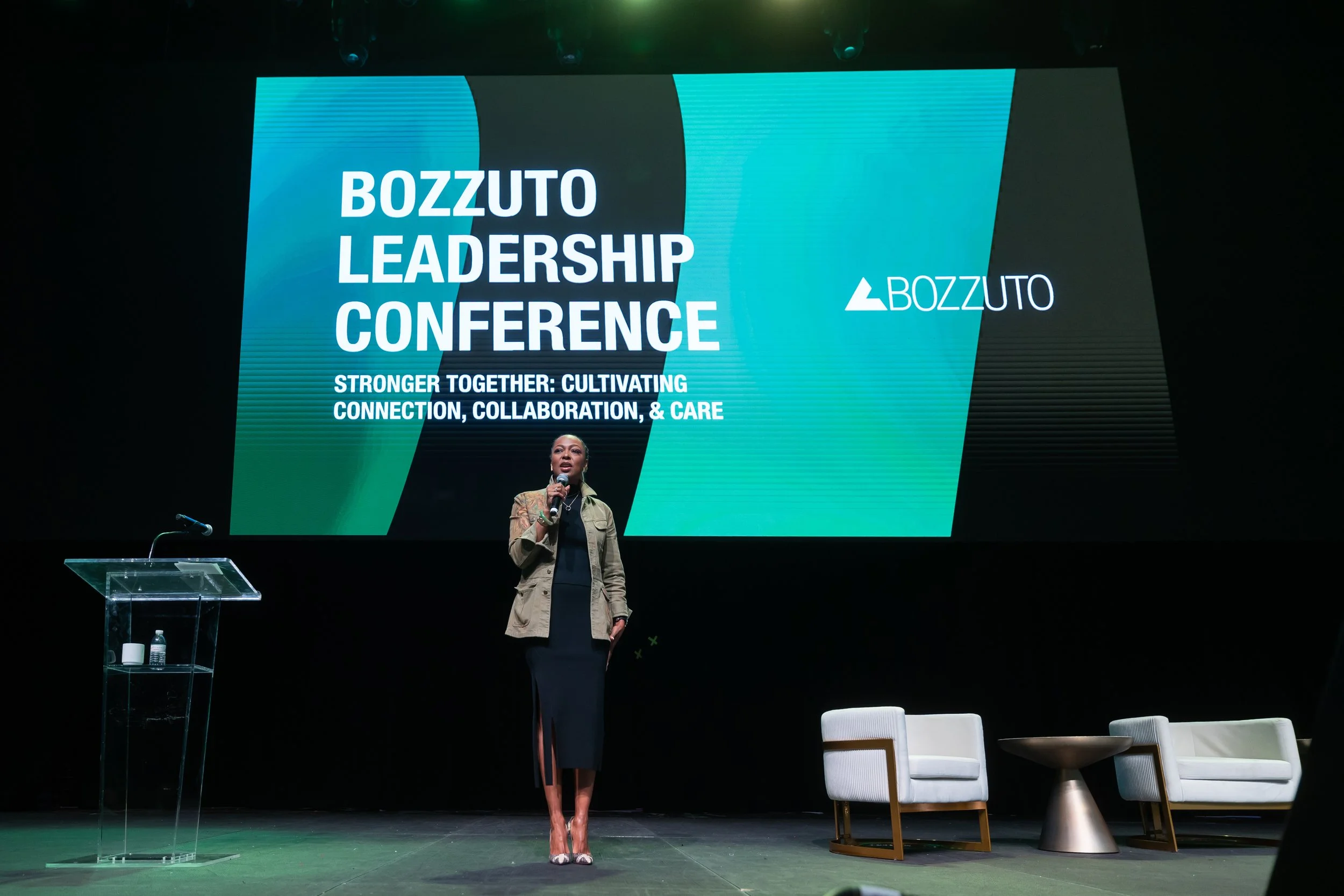 Corporate leader standing on the Bozzuto Leadership Conference stage. Event produced by Stratus Firm, an event production company in Washington, D.C.