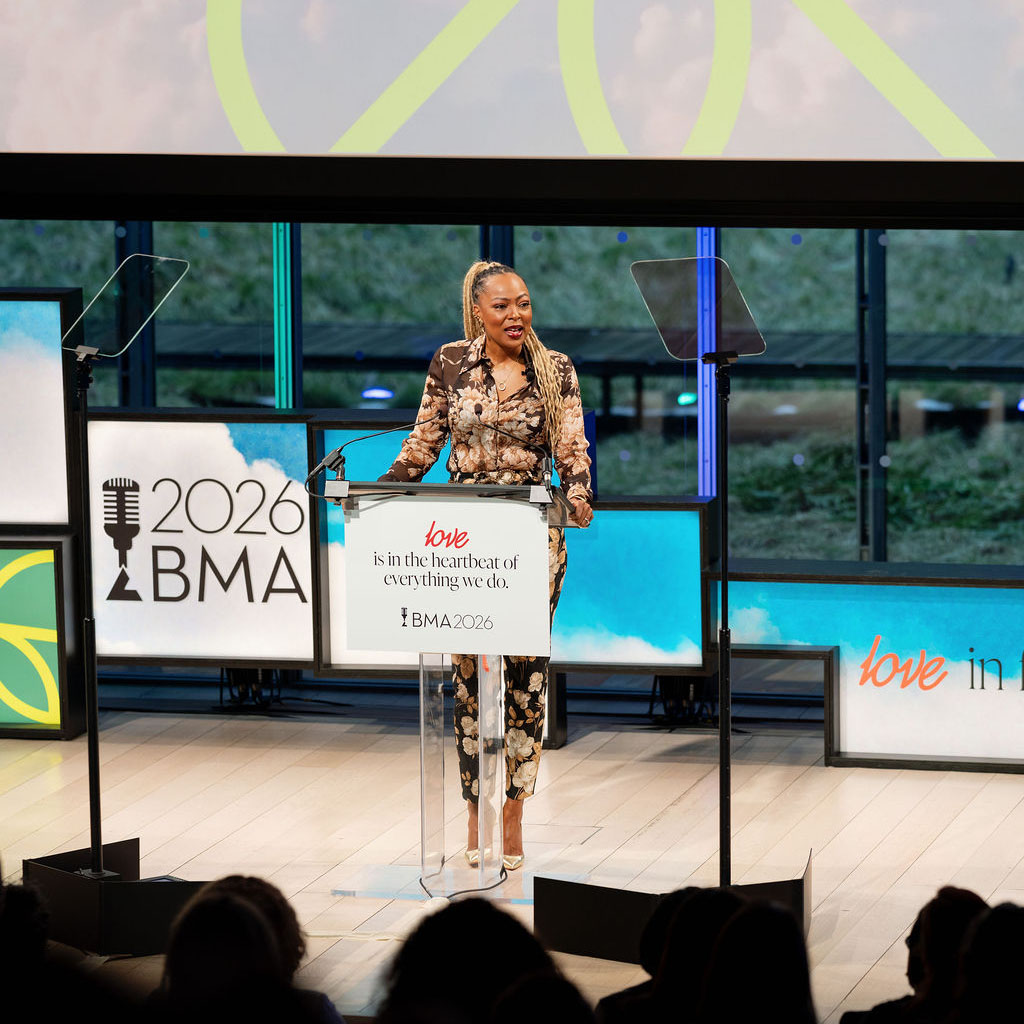 Corporate leader standing on the Bozzuto Leadership Conference stage. Event produced by Stratus Firm, an event production company in Washington, D.C.