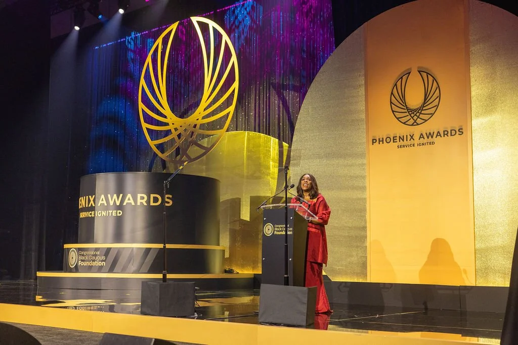 A woman speaks onstage at the Congressional Black Caucus Foundation's 2025 Phoenix Awards