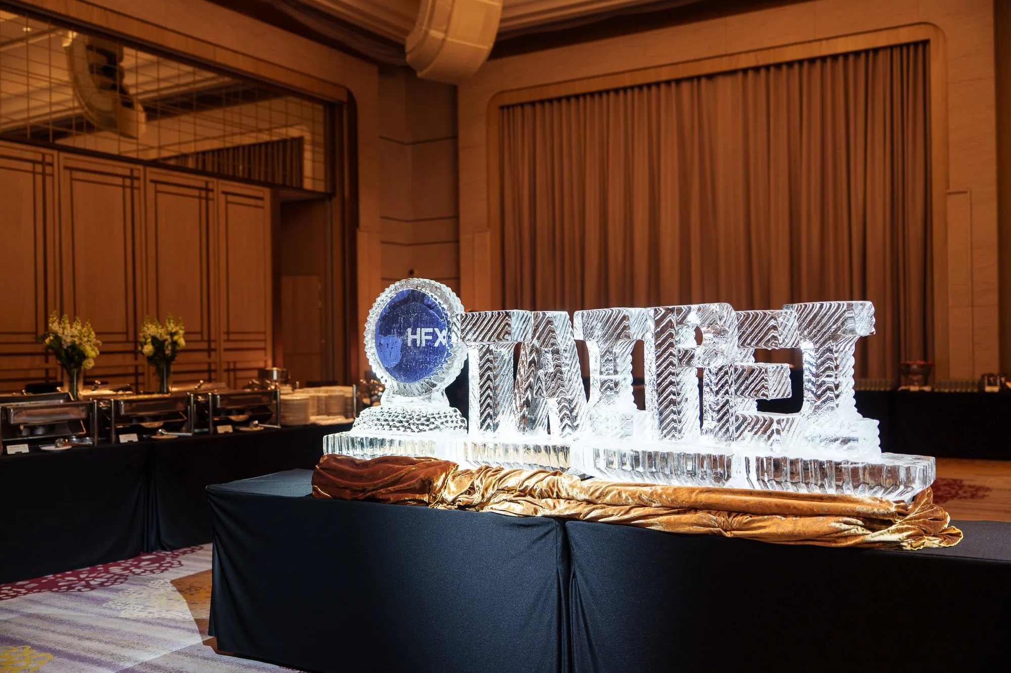 A sculpture in the dining area at the Halifax Taipei conference, displaying the event logo.